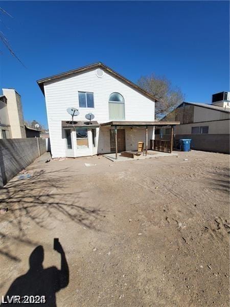 rear view of house with a patio