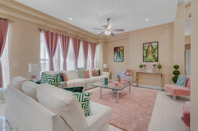 living room with light tile patterned floors and ceiling fan