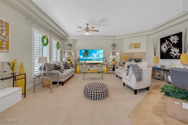 living room featuring light tile patterned floors and ceiling fan