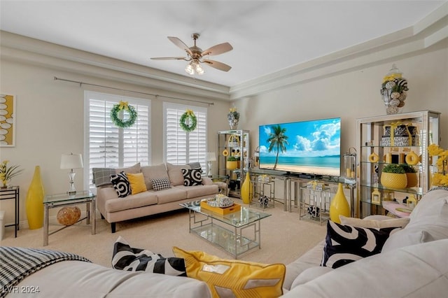 living room with ceiling fan and light colored carpet