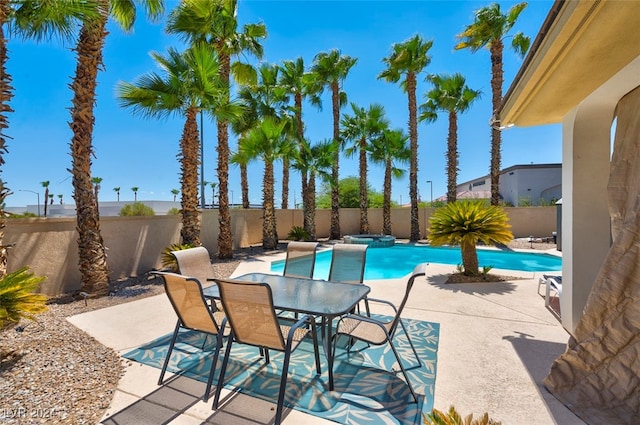 view of swimming pool featuring a patio