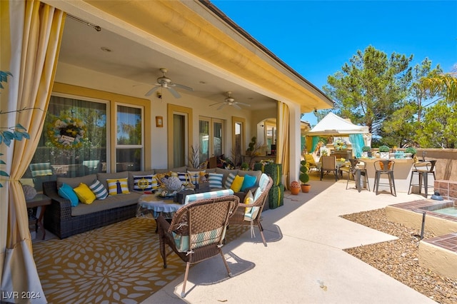 view of patio / terrace featuring outdoor lounge area and ceiling fan