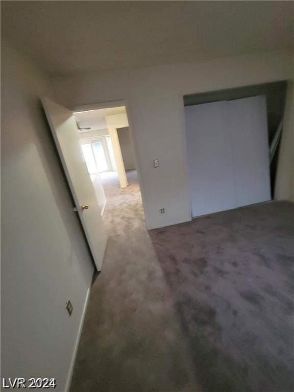 unfurnished bedroom with carpet flooring