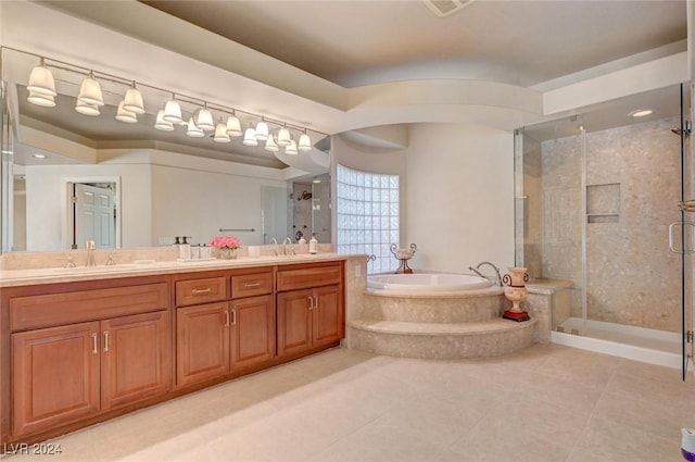 bathroom with a shower stall, a bath, double vanity, and a sink