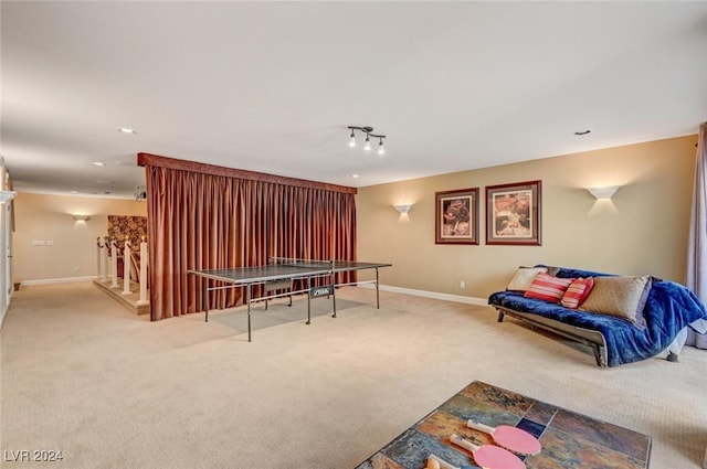 playroom featuring recessed lighting, rail lighting, baseboards, and carpet floors