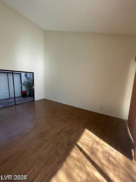 empty room featuring wood-type flooring