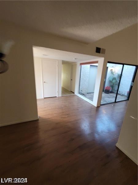 empty room featuring hardwood / wood-style floors