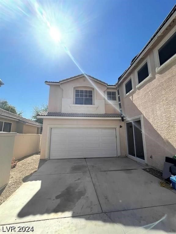 exterior space with a garage