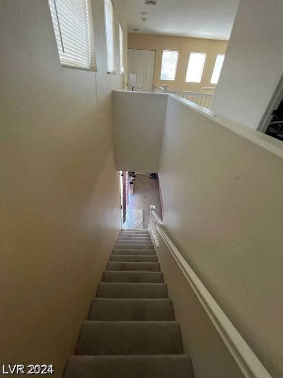 stairway with a high ceiling