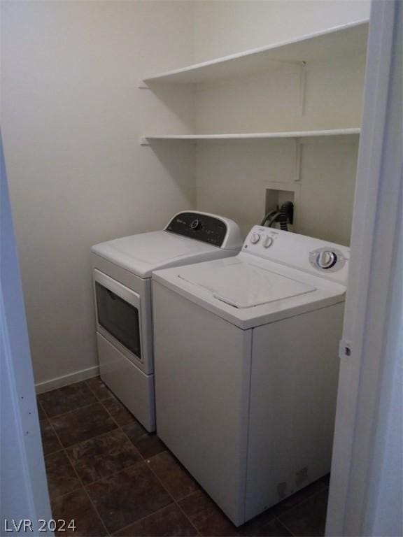 1501 Linnbaker Ln Unit 103, Las Vegas, NV 89110 - laundry room with washing machine and dryer and baseboards