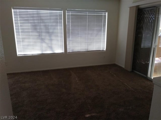 1501 Linnbaker Ln Unit 103, Las Vegas, NV 89110 - spare room featuring carpet flooring and baseboards