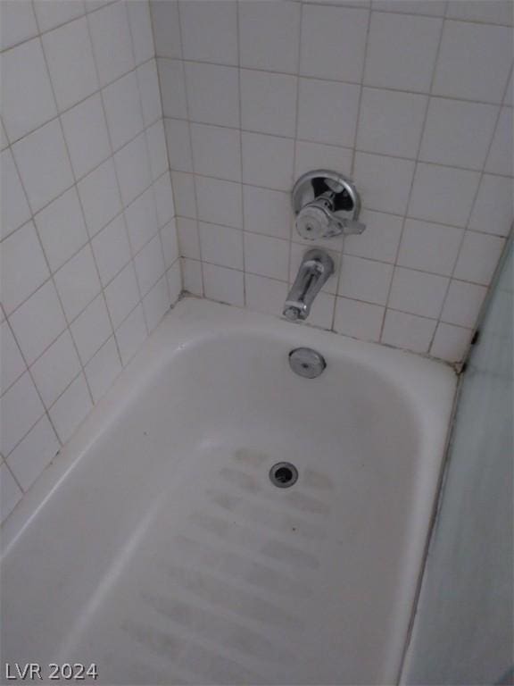 1501 Linnbaker Ln Unit 103, Las Vegas, NV 89110 - bathroom view of a tub to relax in and a shower