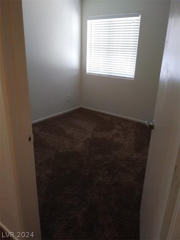1501 Linnbaker Ln Unit 103, Las Vegas, NV 89110 - unfurnished room with carpet floors and baseboards