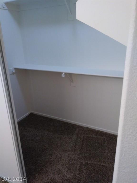 1501 Linnbaker Ln Unit 103, Las Vegas, NV 89110 - spacious closet featuring dark carpet