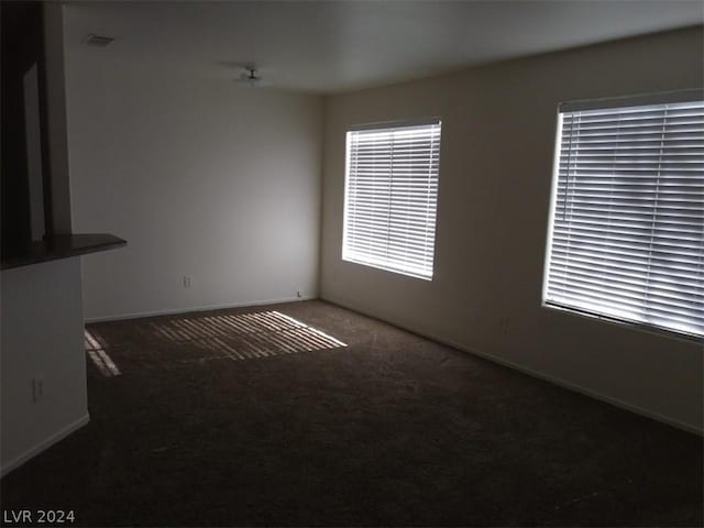 1501 Linnbaker Ln Unit 103, Las Vegas, NV 89110 - spare room with carpet flooring and plenty of natural light