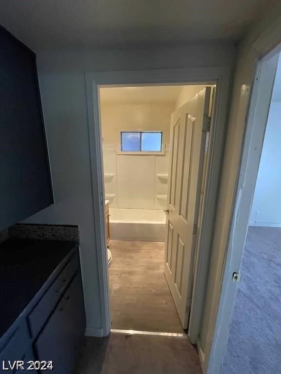 corridor featuring hardwood / wood-style flooring