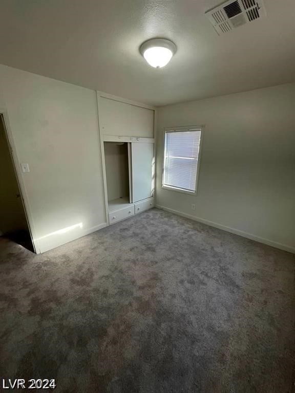 unfurnished bedroom featuring carpet floors