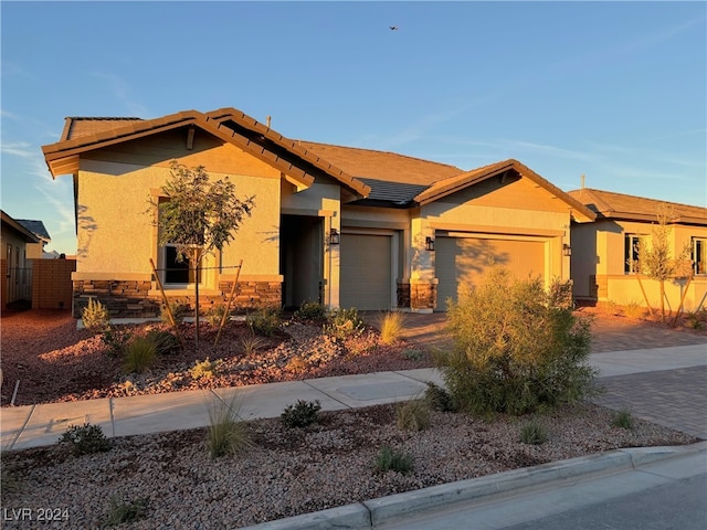 view of front of property featuring a garage