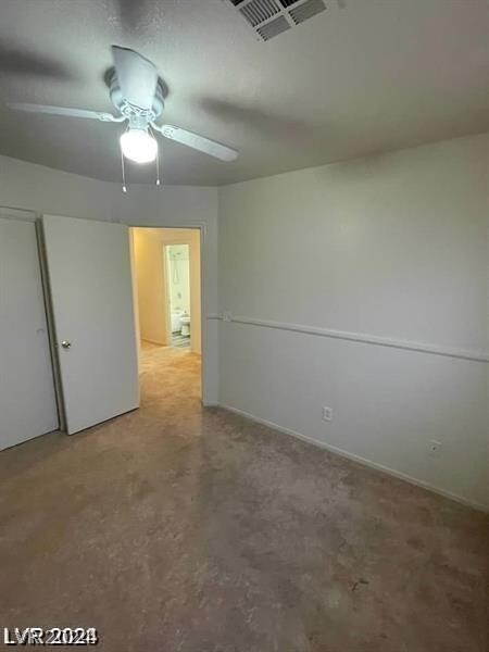 empty room featuring ceiling fan