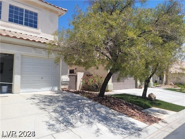 view of property exterior with a garage