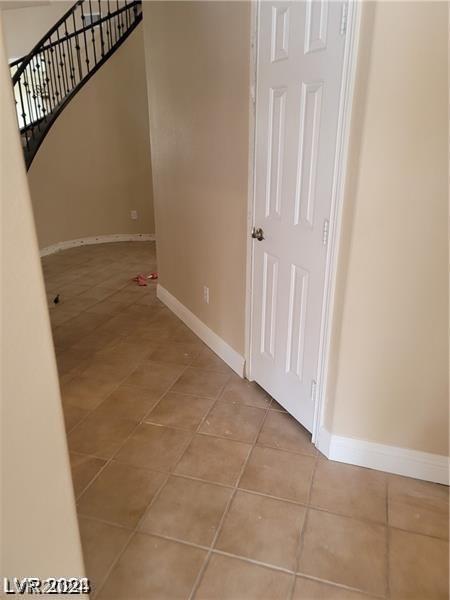 interior space with light tile patterned flooring