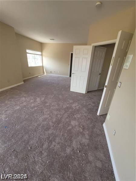 unfurnished bedroom featuring carpet flooring