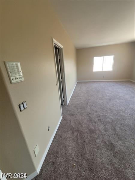 spare room featuring carpet floors