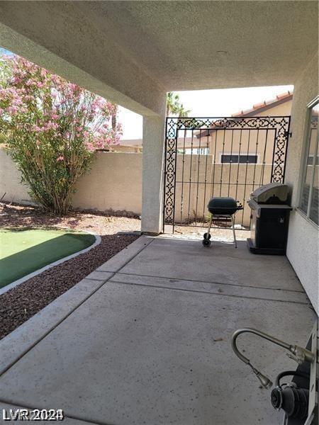 view of patio with a grill