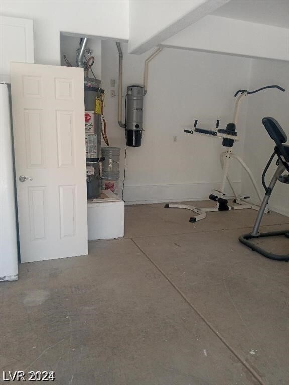 garage featuring white fridge