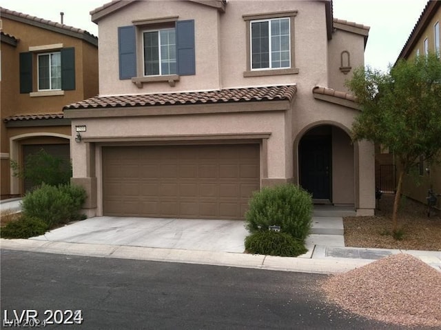 view of front of house with a garage