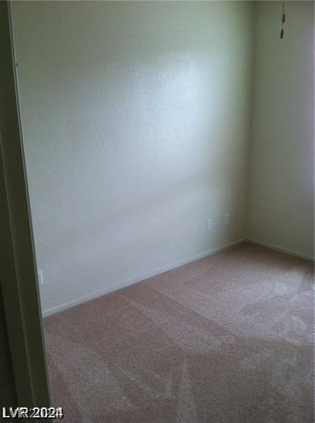 unfurnished room with carpet flooring