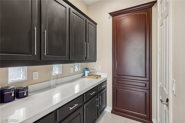 kitchen featuring light tile patterned flooring