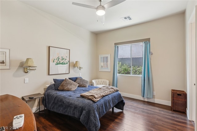 bedroom featuring dark hardwood / wood-style floors and ceiling fan