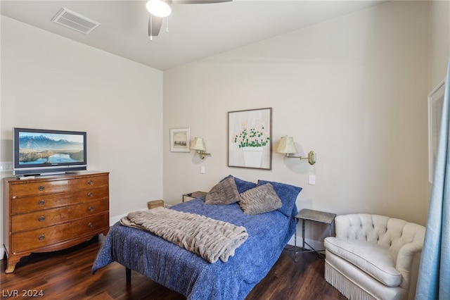 bedroom with ceiling fan and dark hardwood / wood-style floors