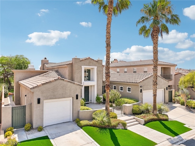 mediterranean / spanish-style house featuring a garage