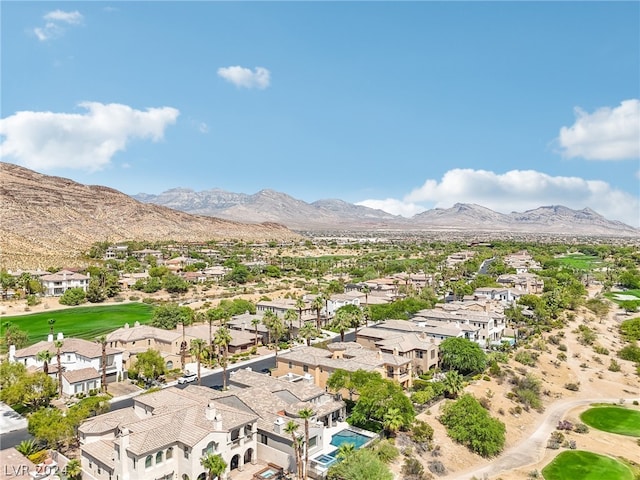 drone / aerial view featuring a mountain view