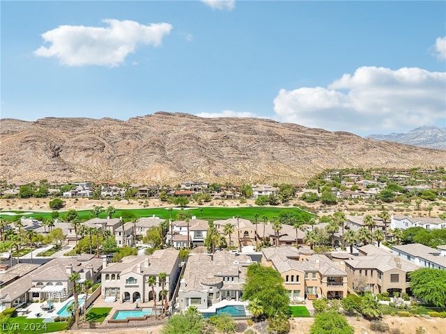 bird's eye view with a mountain view