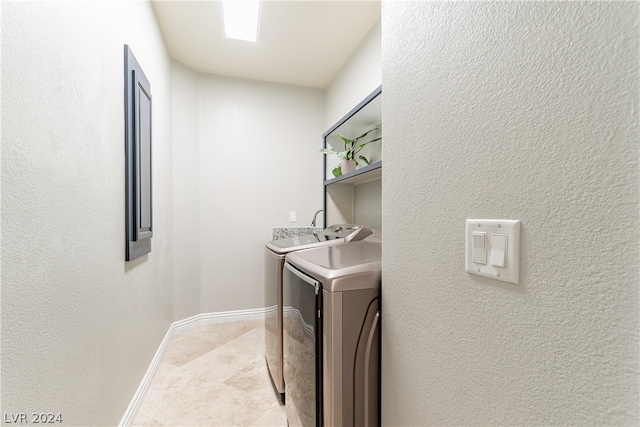 laundry room featuring independent washer and dryer