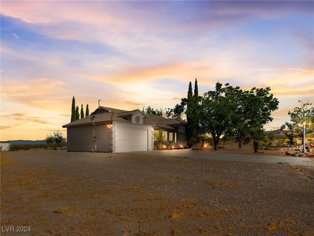 view of front of property with a garage