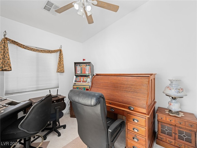 office with ceiling fan, lofted ceiling, and light colored carpet