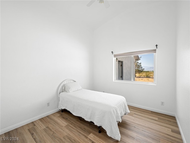 bedroom featuring ceiling fan and light hardwood / wood-style flooring