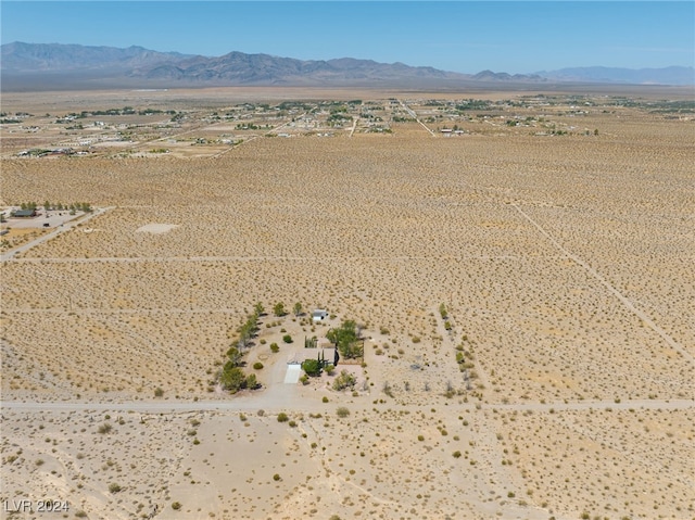 bird's eye view with a mountain view