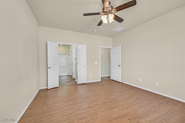 unfurnished bedroom featuring light hardwood / wood-style flooring and ceiling fan