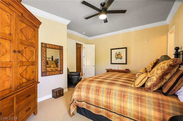 bedroom featuring light colored carpet, crown molding, and ceiling fan