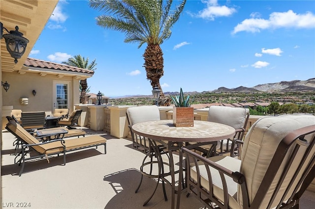 view of patio with a mountain view