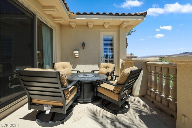 view of patio / terrace with a balcony