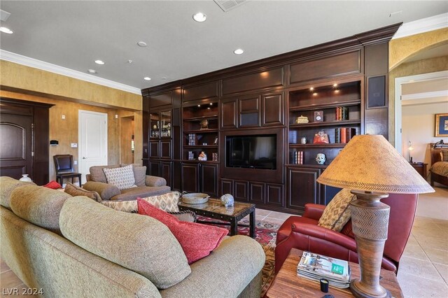 living room featuring built in features, crown molding, and light tile patterned floors