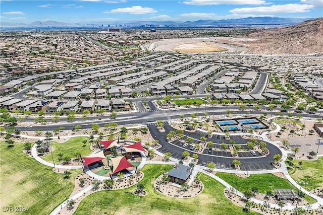 drone / aerial view featuring a mountain view