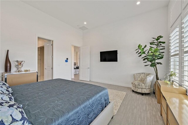 bedroom with a high ceiling