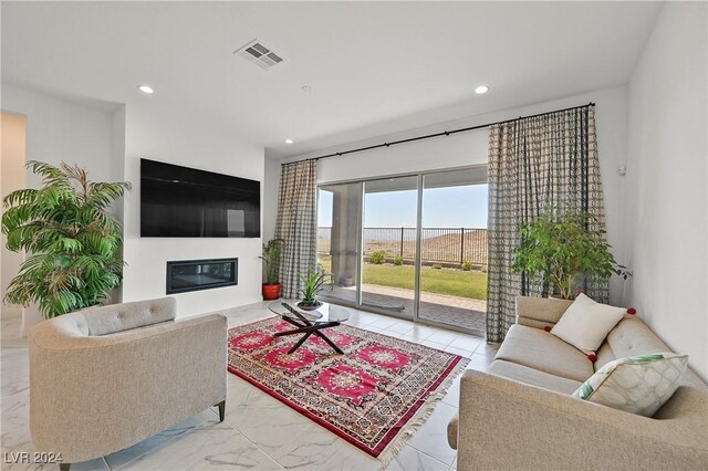 living room featuring light tile patterned flooring